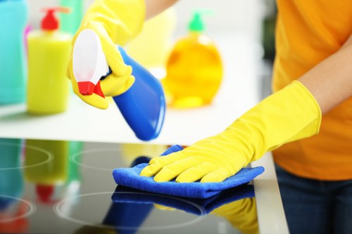 Local Surrey team cleaning vinyl and safety flooring with specialist equipment