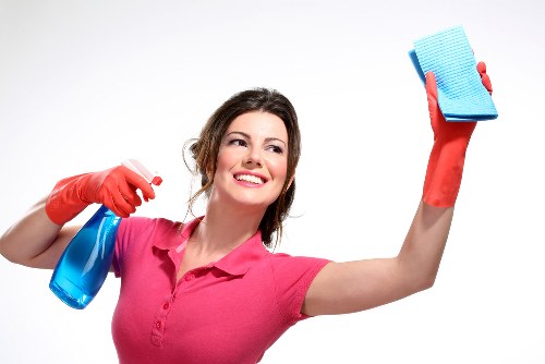 Cleaning kitchen and washroom areas in a Surrey office