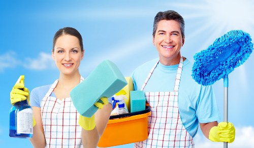 Local specialist treating stains and odours on a mattress in a Surrey home