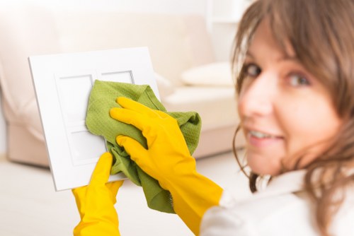 Technician treating upholstery stain in Surrey